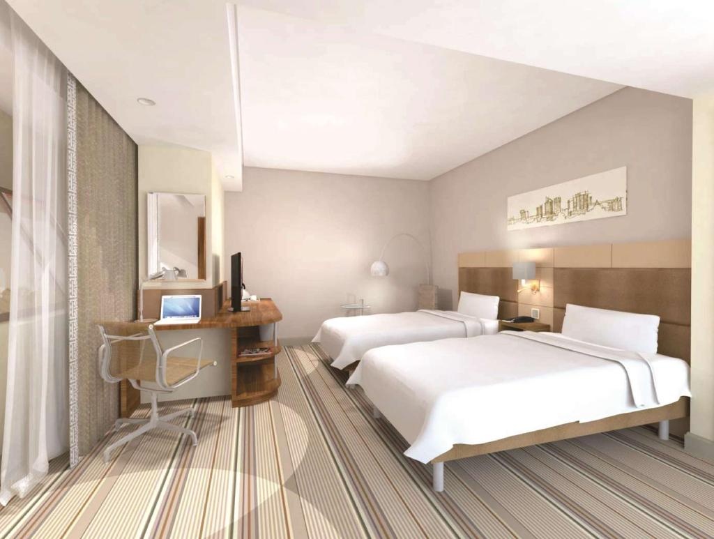 Hilton Garden Inn Lusaka Society Business Park  Rooms  Twin Room Guestroom 7   Copy